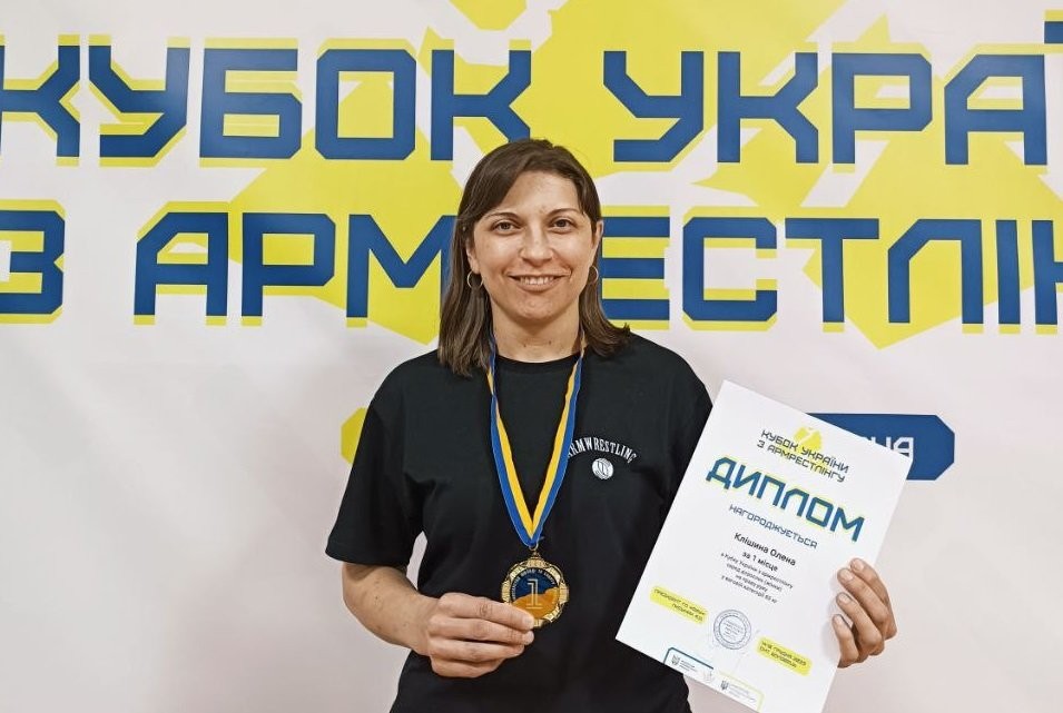 Член команди Олена